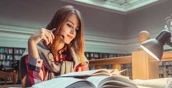 Female student reading an essay